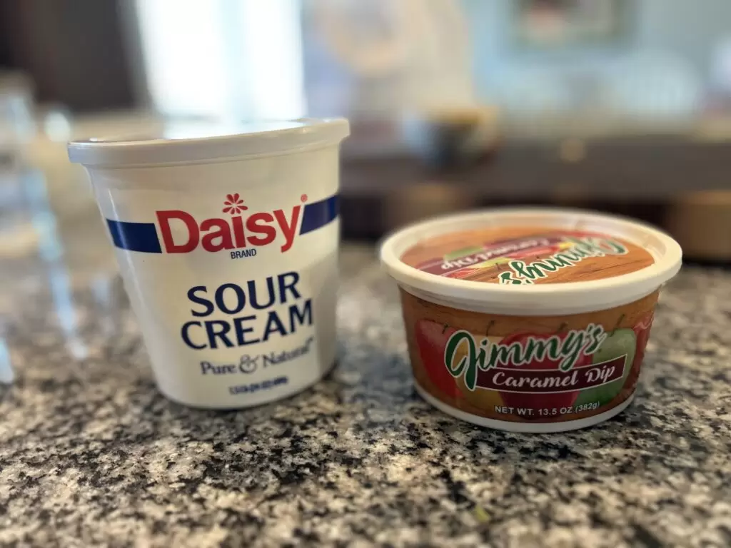 Delicious 2-Ingredient Fruit Dip Recipe Sour cream and caramel dip are the only ingredients for this two ingredient fruit dip.