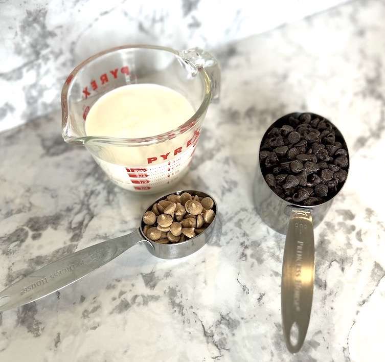 A cup of milk, a cup of chocolate chips and aquater cup of peanut butter chips are all you need to make peanut butter hot chocolate!