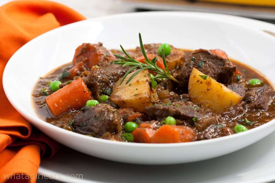 Bowl of Guinness Stew garnished with rosemarry