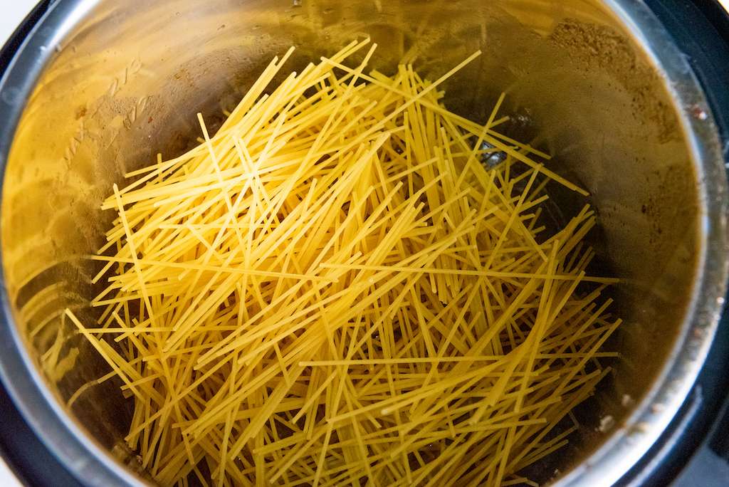 Instant Pot Lo Mein Process 8 - adding the noodles