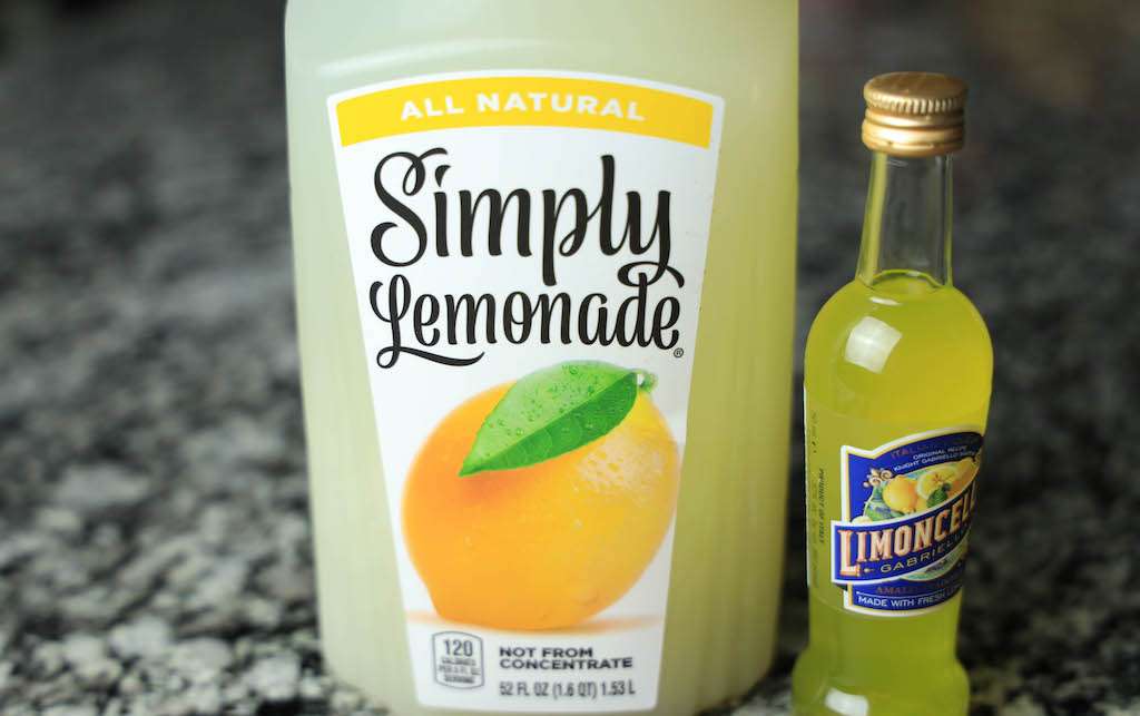 Limoncello lemonade ingredients including a bottle of Simply lemonade and a small bottle of limoncello.