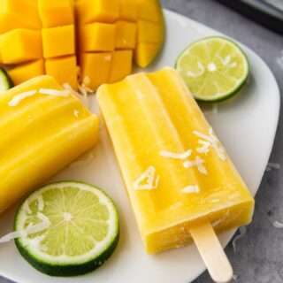 Mango Lime Popsicles on a plate