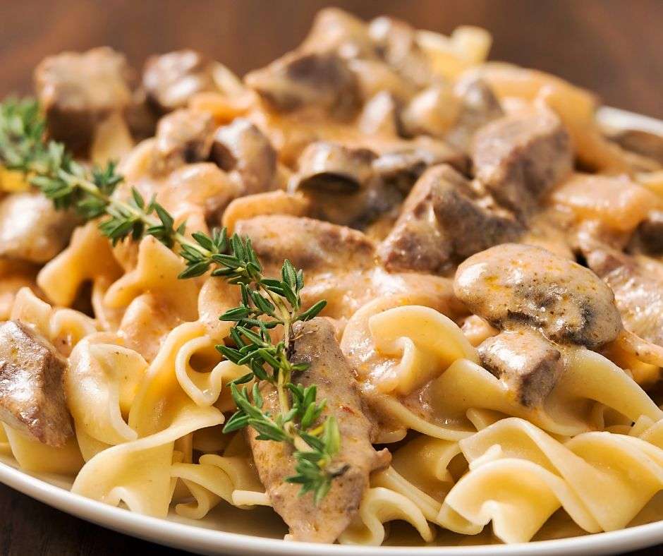 Beef Stroganoff on top of egg noodles one of the best side dishes for beef stroganoff.