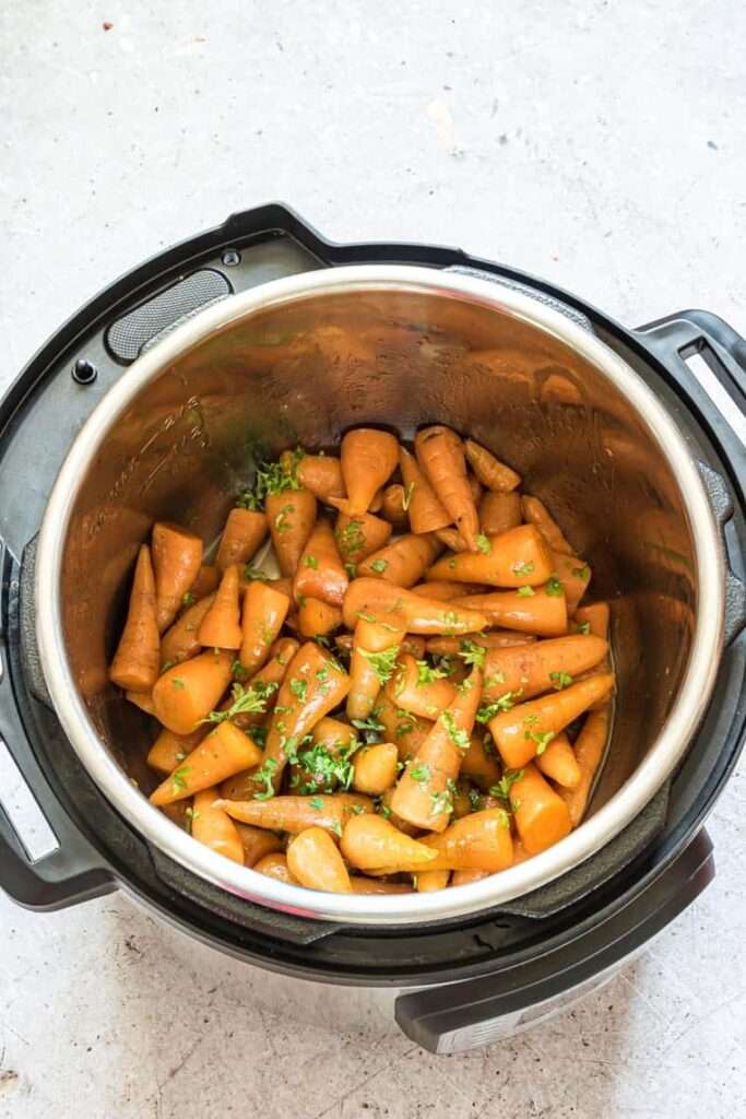 Instant Pot honey glazed carrots garnished with parsley