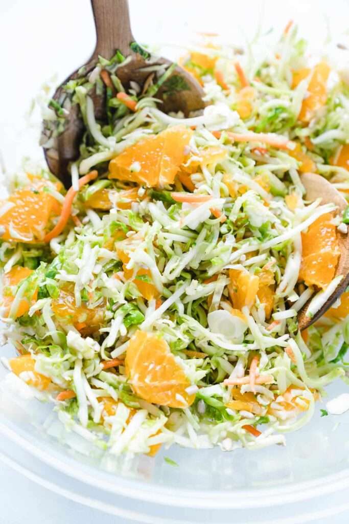 Shredded cabbage slaw with mandarin oranges, carrots, and seeds