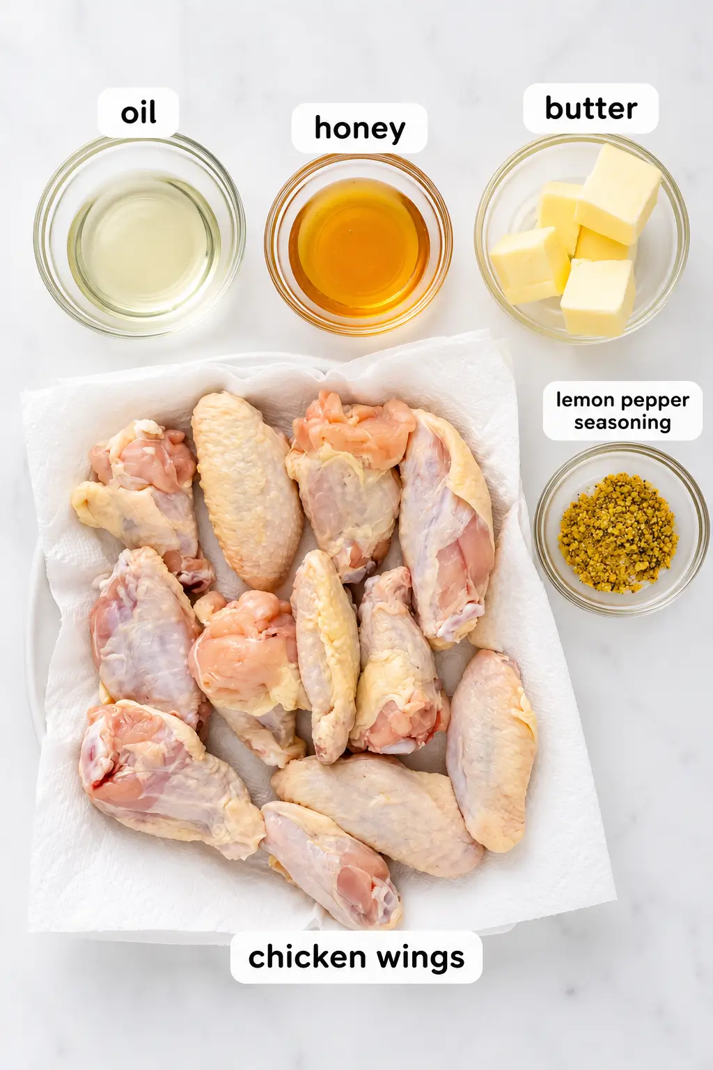 Lemon pepper wings ingredients: chicken, oil, honey, butter, seasoning.