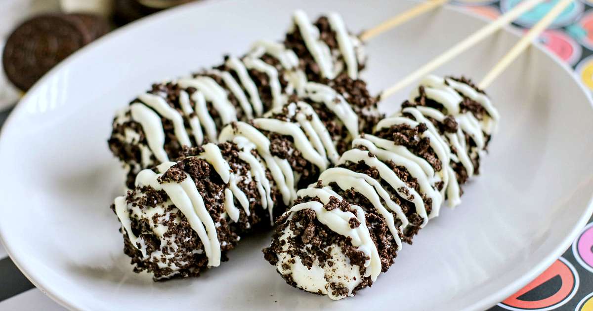 Oreo Marshmallow pops on a white plate