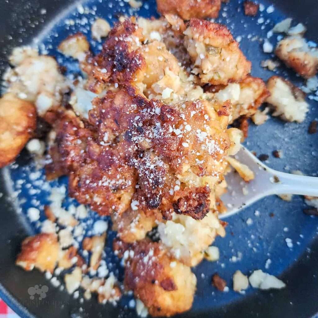 13 Pie Iron Recipes - Sweet & Savory Crispy cauliflower fritters with parmesan in skillet