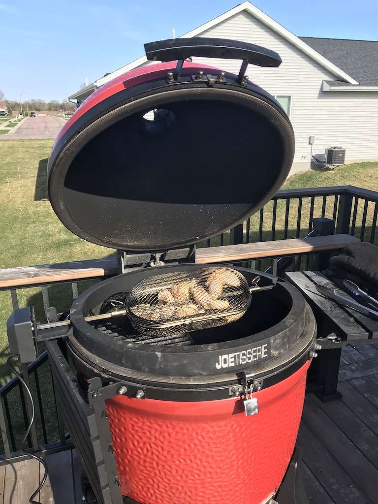 Cooking chicken wings on the Kamado Joe using the Kamado Joe JoTisserie.