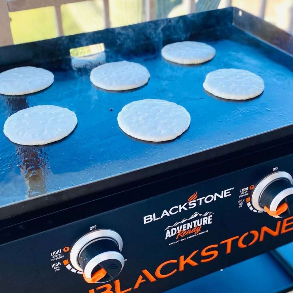15 Best Blackstone Recipes Pancakes cooking on Blackstone flat top griddle outdoors