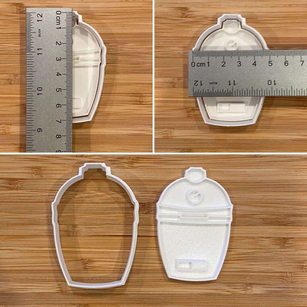 14 Unique Kamado Joe Gifts for Your Grill Master 3D printed droid cookie cutter and stamp measured with metal rulers on wood