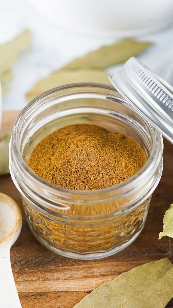 Pumpkin pie spice mix in a small mason jar.