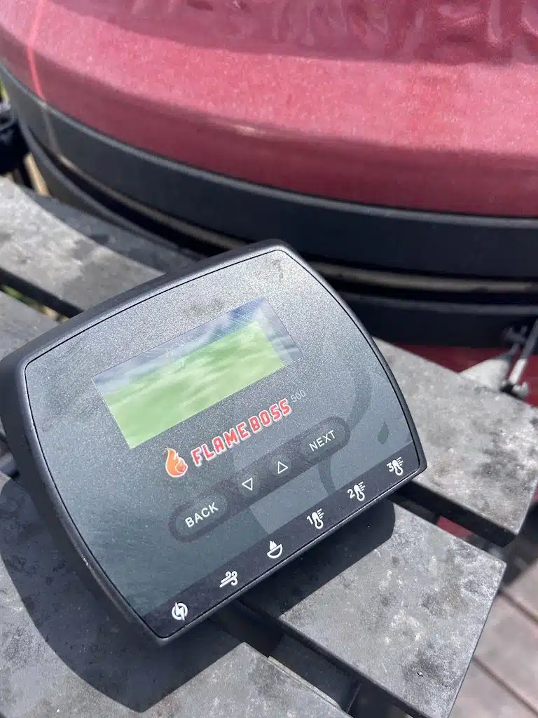Flame Boss 500 Review: Is It Worth the Investment? The command center of the Flame Boss 500 on the side table of my Kamado Joe Grill.