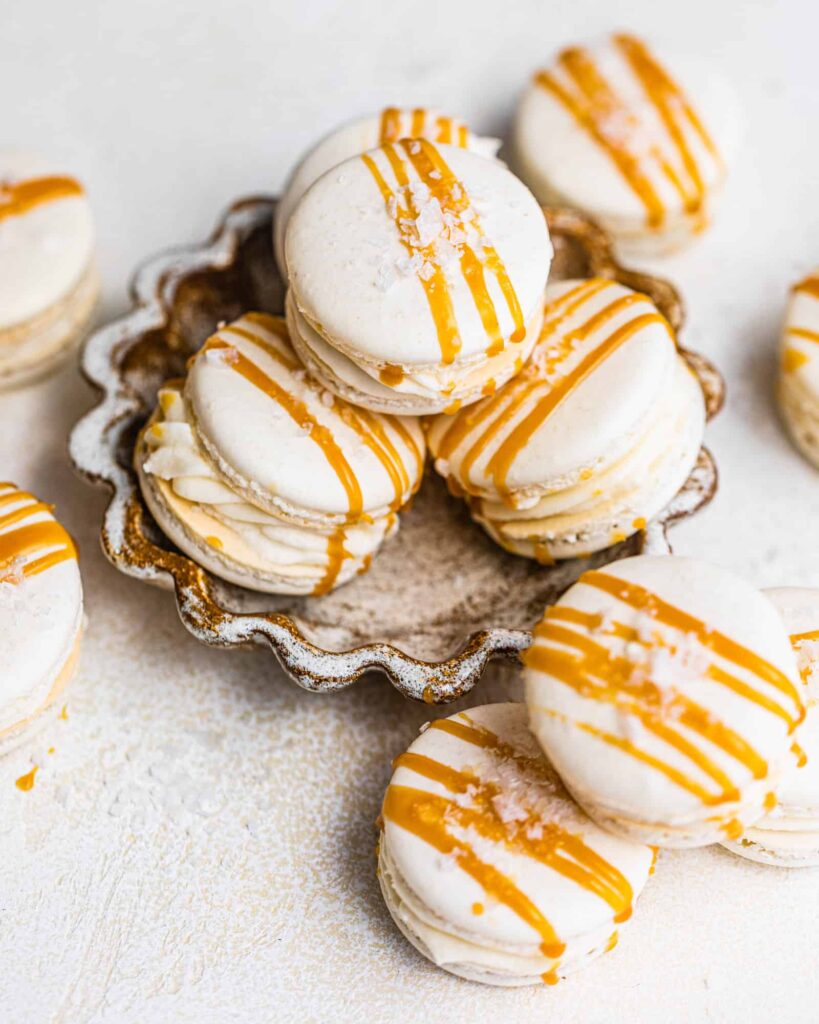 8 Traditional Christmas Flavors Salted caramel macarons with caramel drizzle and sea salt