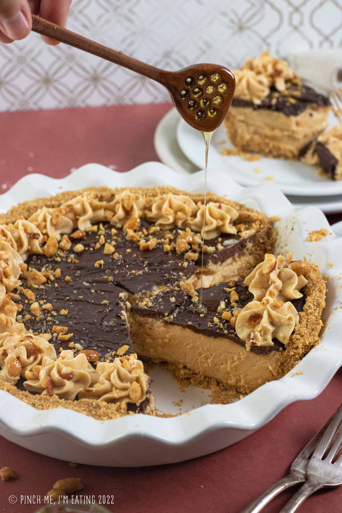 A pie pan filled with delicious peanut butter pie.