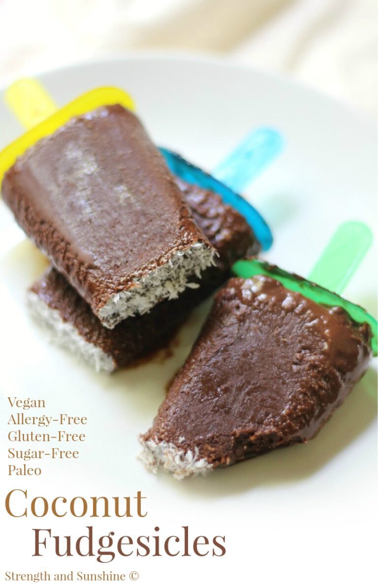 Sugar Free vegan coconut fudge popsicles on a white plate.