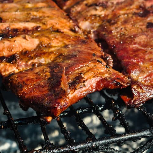 Cowboy candy BBQ sauce on ribs on the grill.