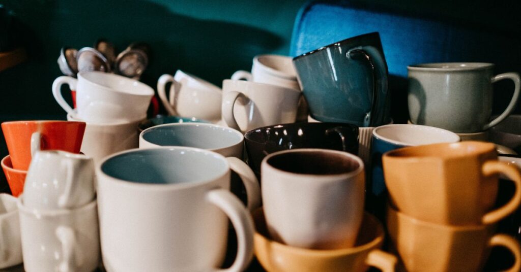 A selection of mugs in a variety of shapes, sizes, and colors.