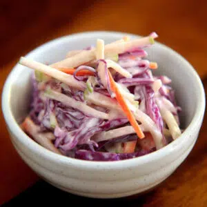 Spicy Cowboy candy coleslaw in a white bowl.