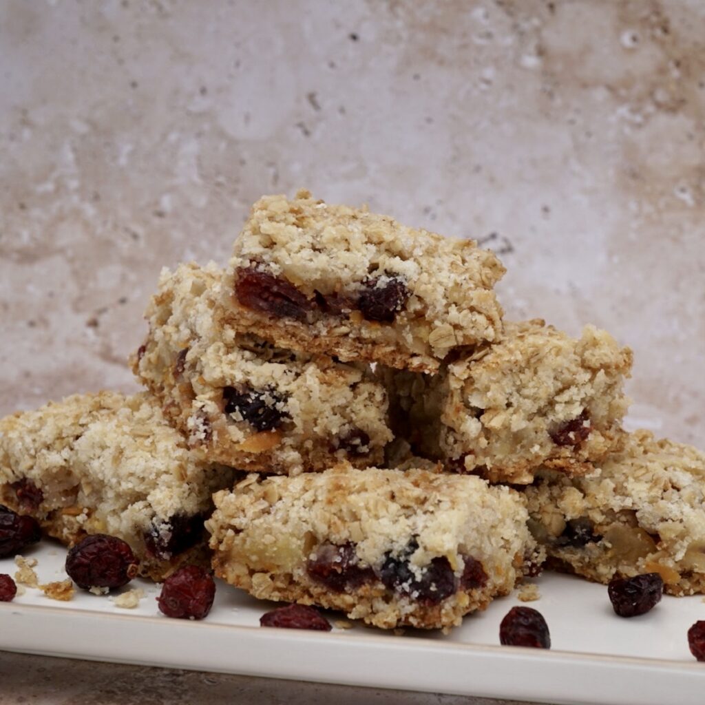 Homemade oatmeal cranberry crumble bars on plate