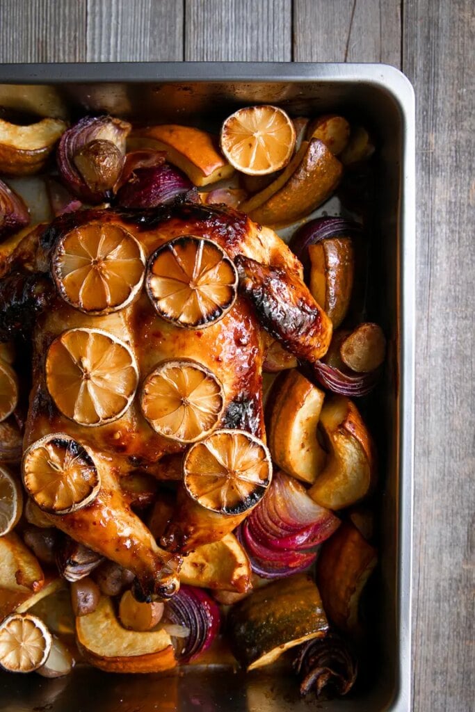 Sheet-pan roast chicken with lemon slices and roasted vegetables