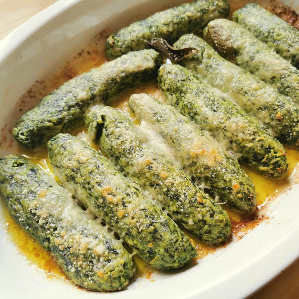 Baked spinach ricotta gnocchi with parmesan and sage butter