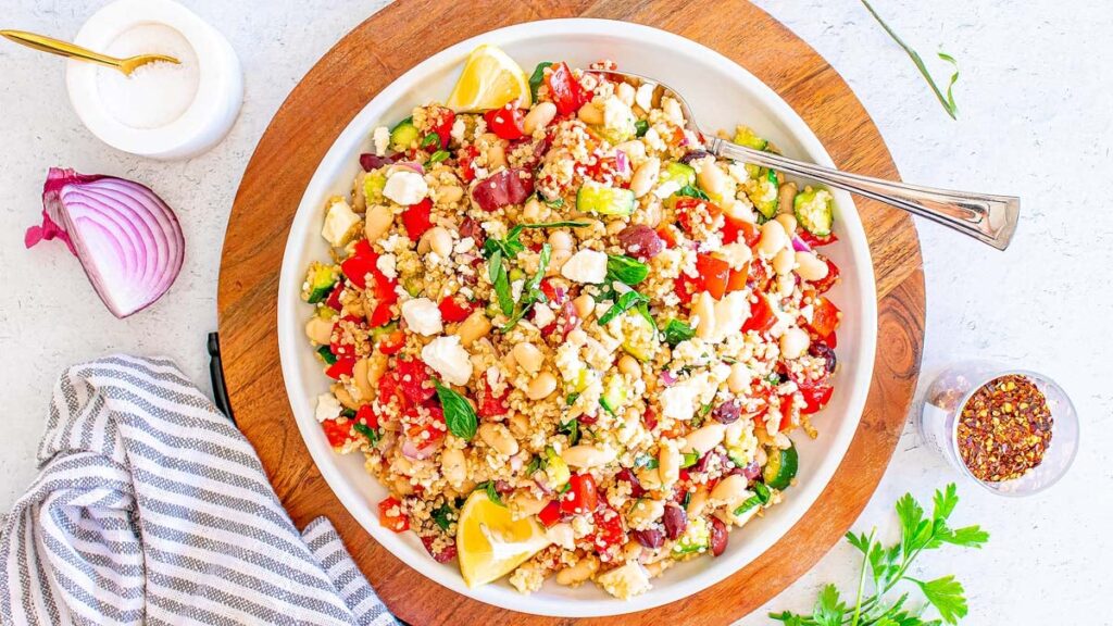 Mediterranean quinoa salad with feta, white beans, cucumber, and lemon