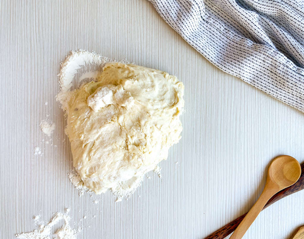 No knead pizza dough on a lightly floured counter.