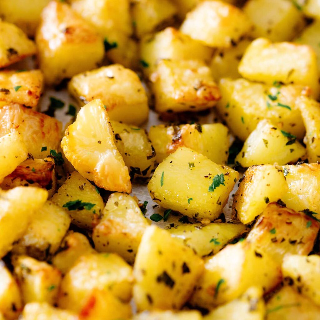 Crispy oven-roasted garlic herb potatoes with parsley