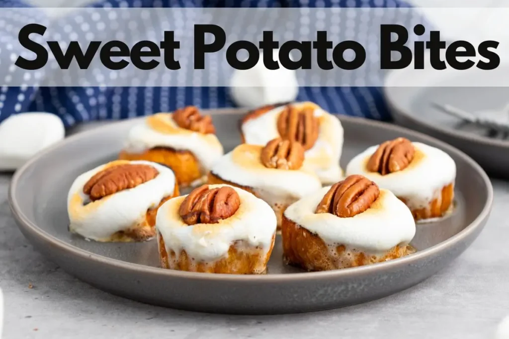 Sweet potato rounds with marshmallows and pecans on a gray plate