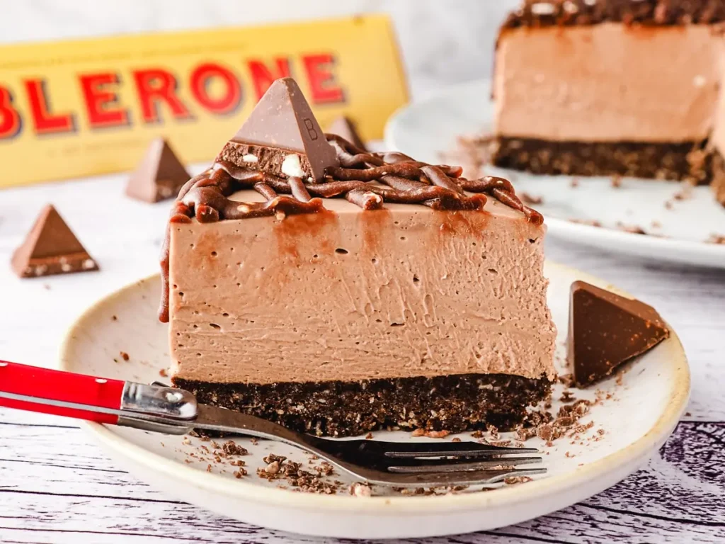 Decadent Toblerone Cheesecake featuring a creamy chocolate filling with a rich almond flour crust. A luxurious choice for almond flour recipes desserts, combining the nuttiness of almond flour with the sweetness of Toblerone chocolate.