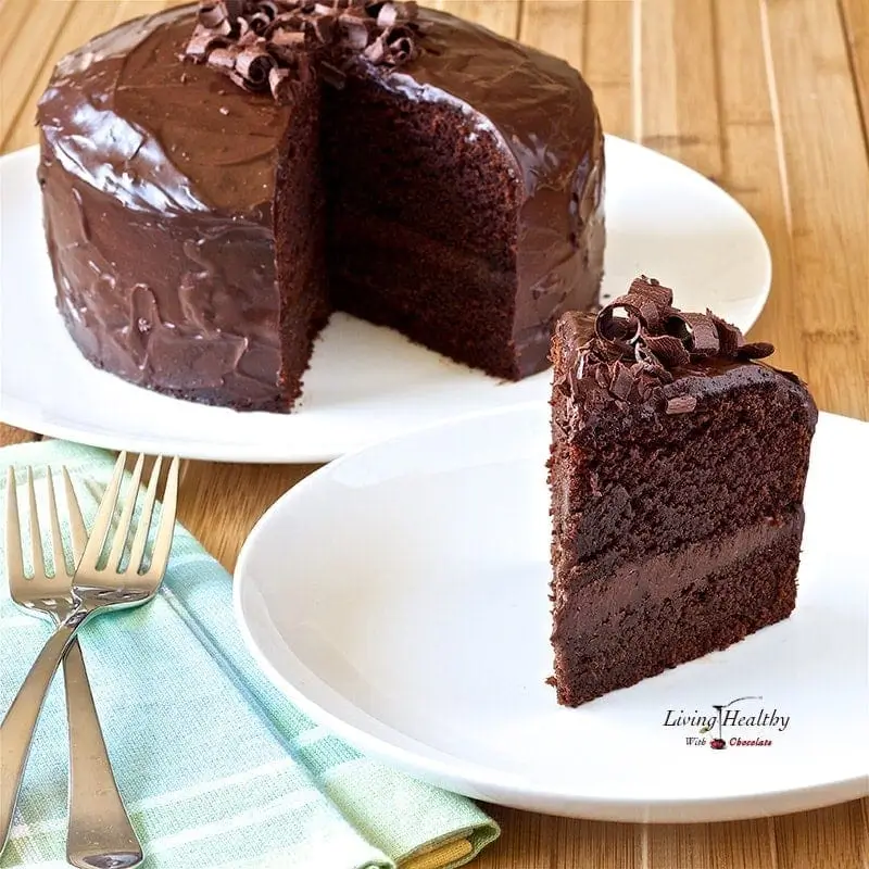 A rich and decadent paleo chocolate cake, layered with chocolate frosting, perfect for gluten-free and dairy-free dessert lovers.