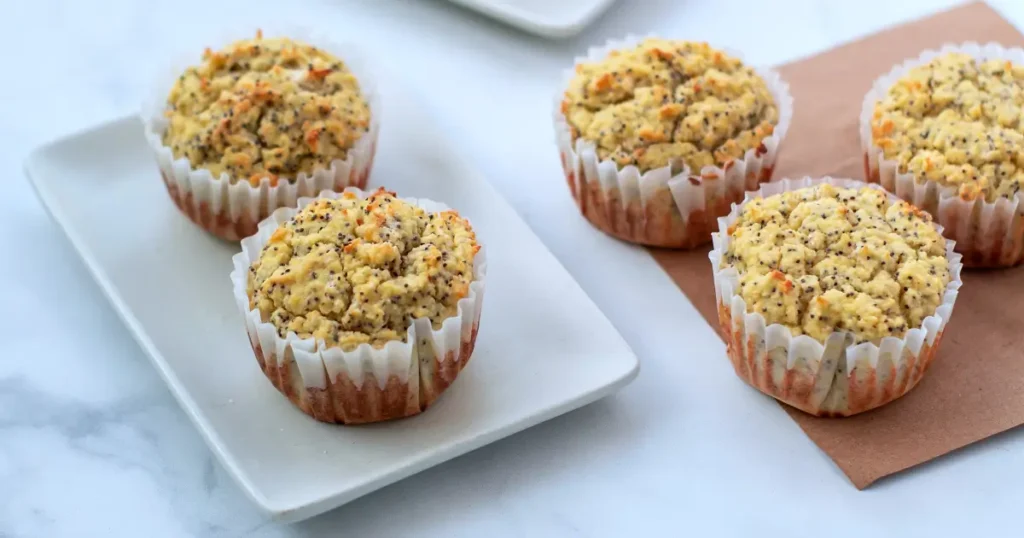 A batch of keto-friendly lemon poppy seed muffins made with almond flour. These low-carb and gluten-free muffins are an ideal snack or breakfast option.