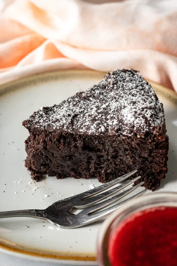 Rich and indulgent vegan almond chocolate cake, made with recipes almond flour and packed with bold chocolate flavors for a guilt-free treat.