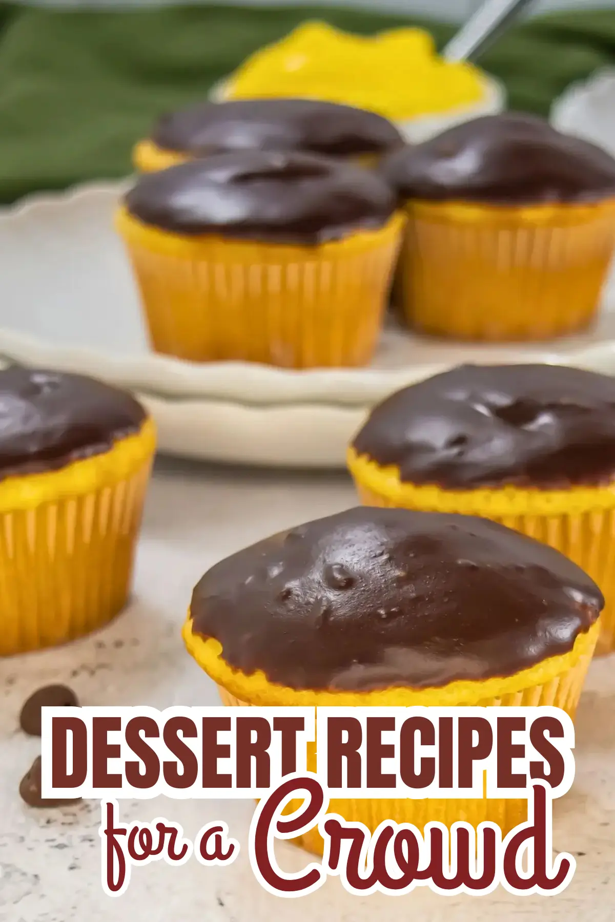 Chocolate ganache cupcakes in yellow liners—easy dessert recipes for a crowd