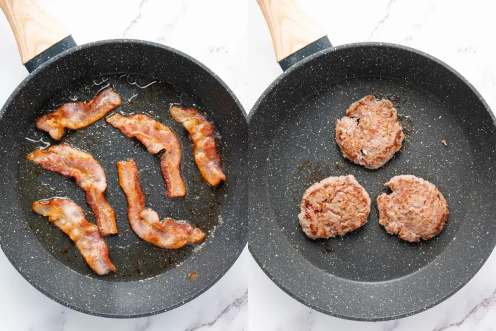 A skillet with sizzling sausage patties and bacon being cooked, the first step in assembling homemade freezer breakfast sandwiches, a great breakfast freezer idea.