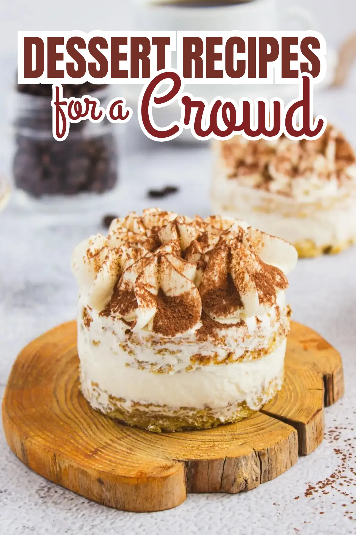 Individual tiramisu mini cake with whipped cream and cocoa, dessert recipes for a crowd.