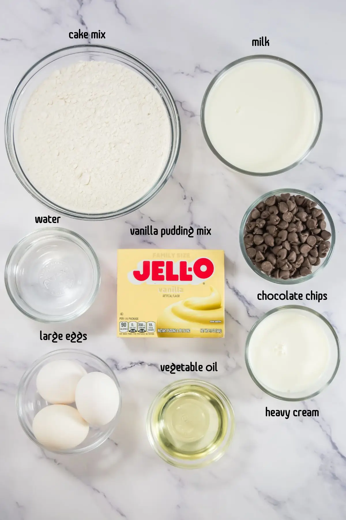Boston Cream Pie Cupcakes Labeled ingredients for cupcakes: cake mix, eggs, oil, water, pudding mix, milk, chips, cream