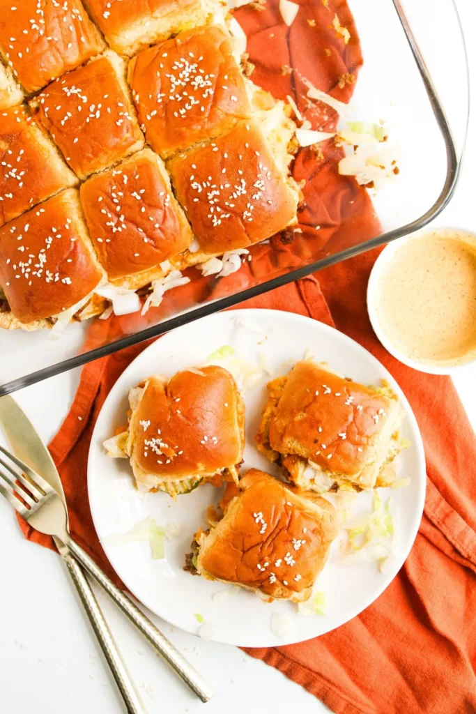 The Best Big Mac Sliders Overhead view of 12 Big Mac Sliders arranged in a baking pan