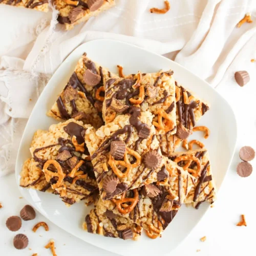 Chocolate Peanut Butter Rice Krispy Treats Peanut butter cup pretzel rice krispie treats with chocolate drizzle