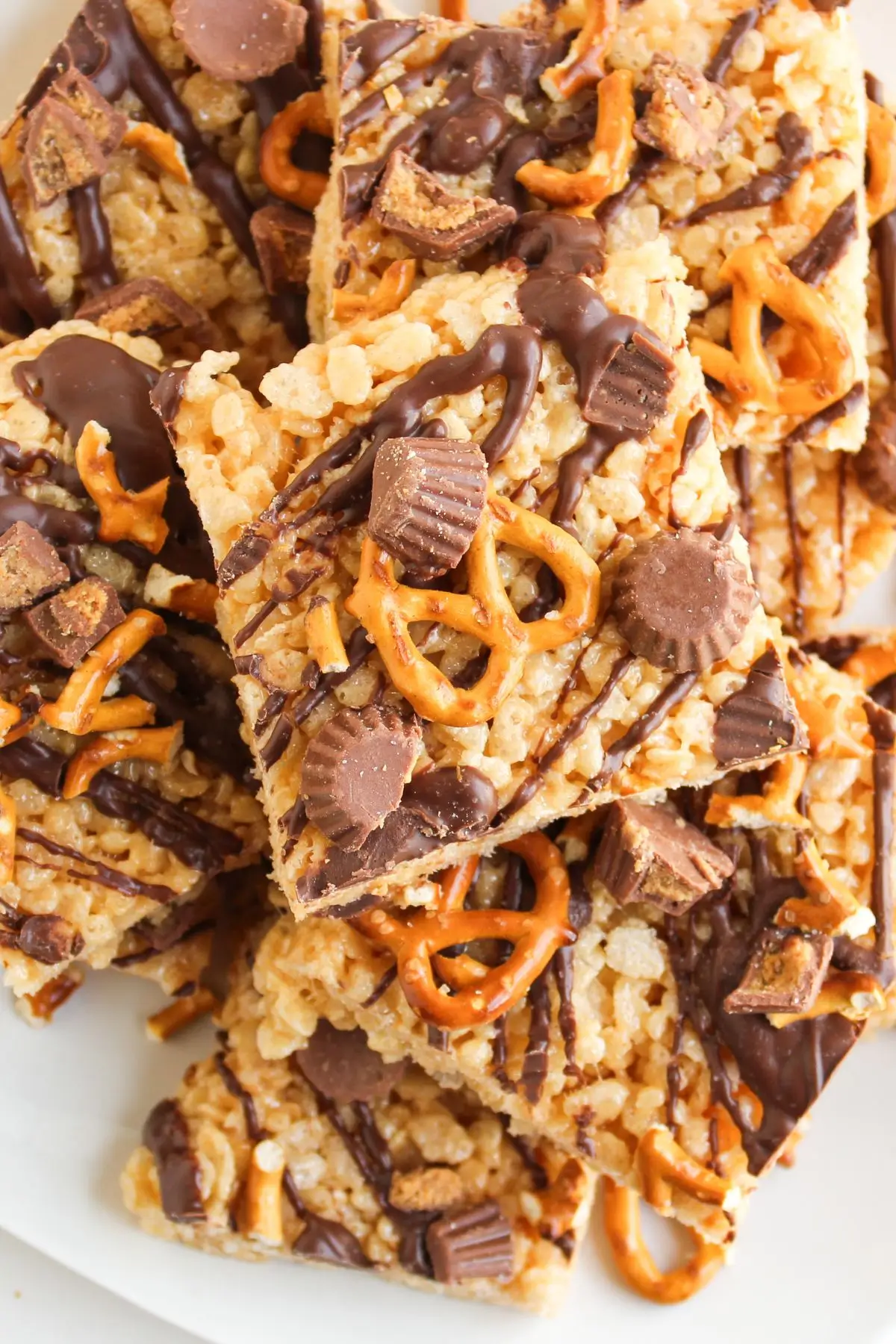 Chocolate Peanut Butter Rice Krispy Treats No-bake Rice Krispie treats with pretzels, chocolate, peanut butter cups