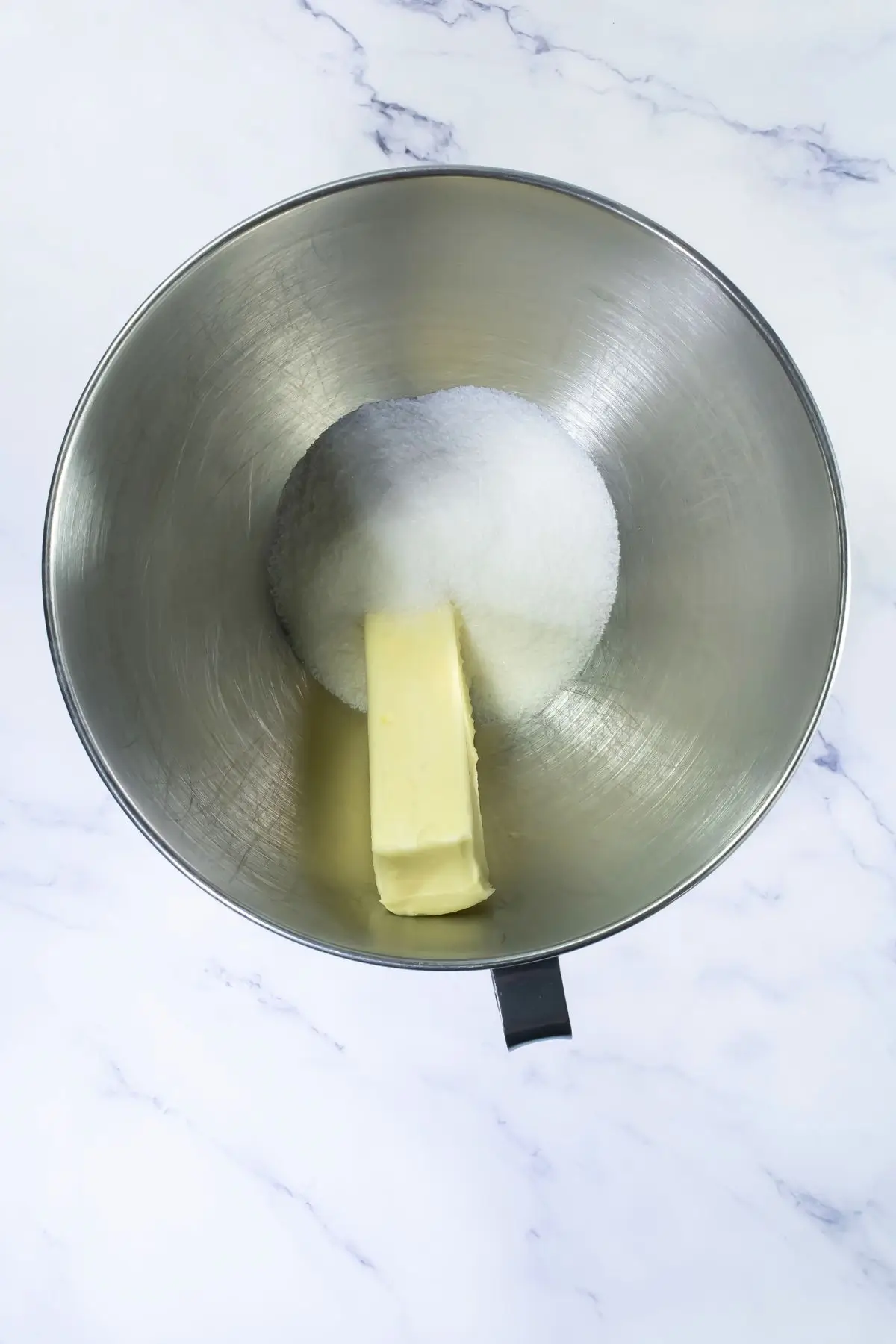 The Bestest Pumpkin Linzer Cookies Butter and granulated sugar in a stand mixer bowl, ready for creaming.