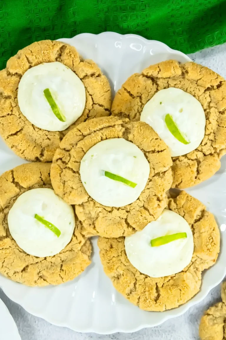 Key lime cheesecake cookies with creamy frosting on plate