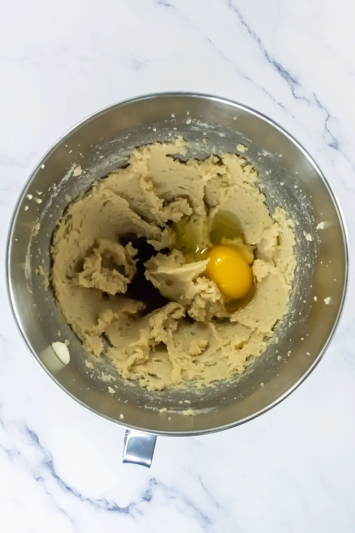 Key Lime Pie Cookies Inspired by Crumble Egg and vanilla added to creamed cookie dough in mixing bowl