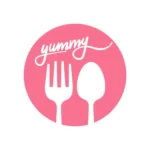 Pink round food logo with fork and spoon icons and yummy script lettering
