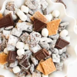 S’mores Muddy Buddies Recipe (S’mores Puppy Chow) Finished S'mores muddy buddies in a white serving bowl
