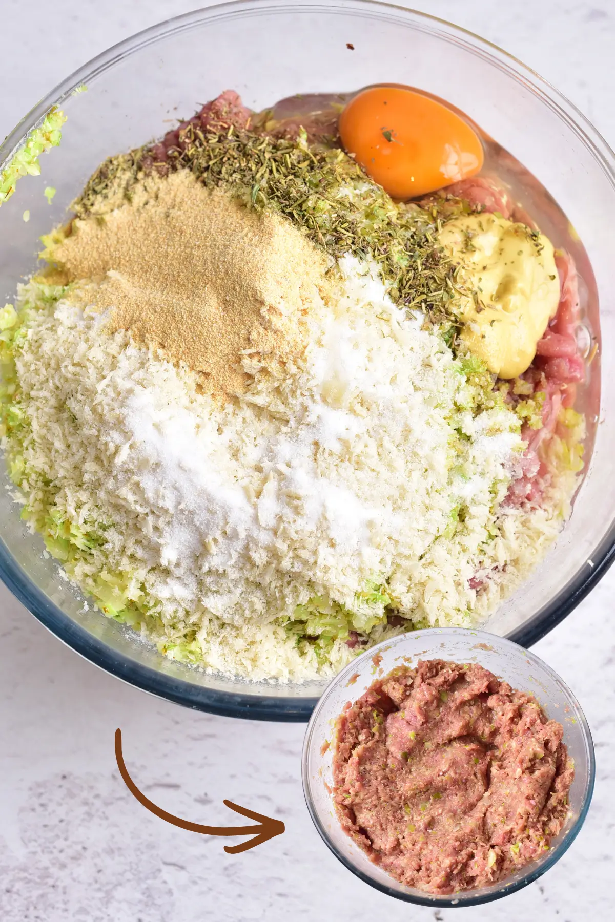 Ground chicken burger ingredients mixed in a bowl