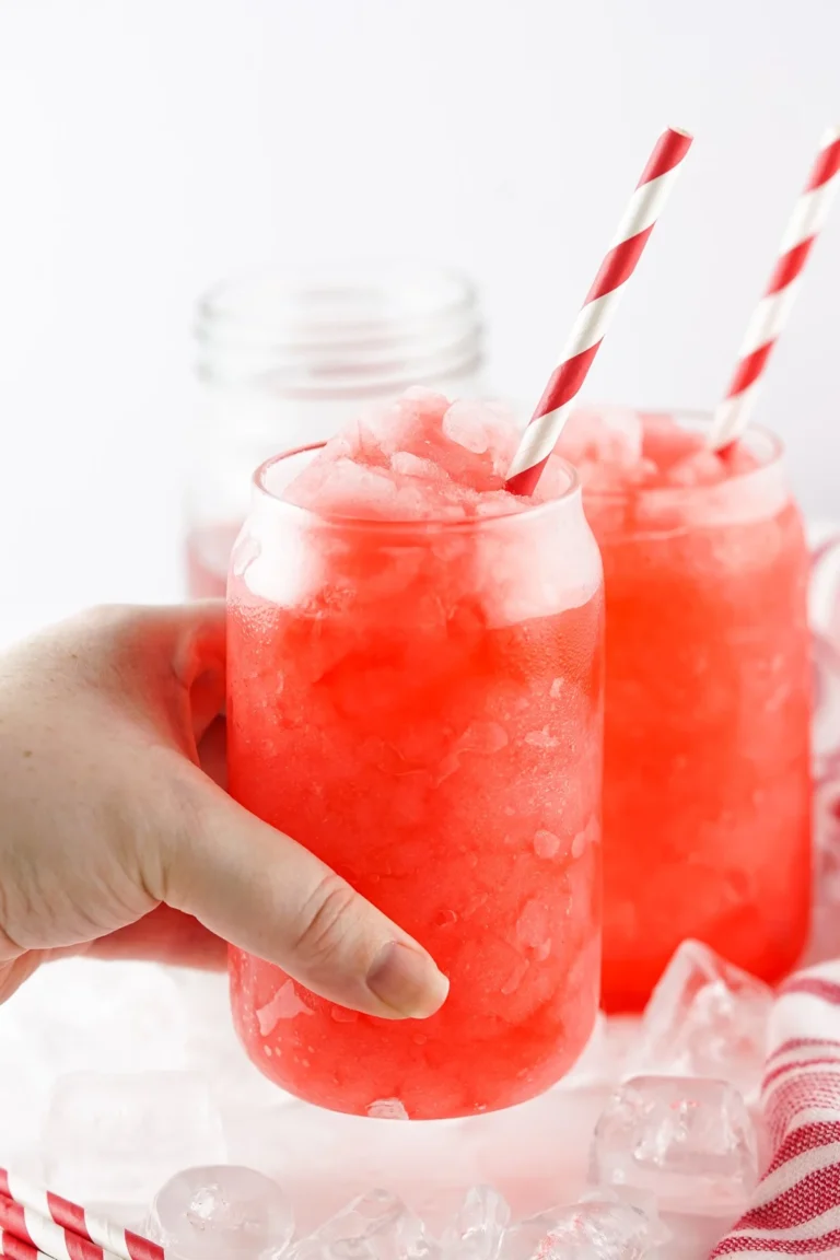 A Hawaiian Punch slushie being held and served immediately.
