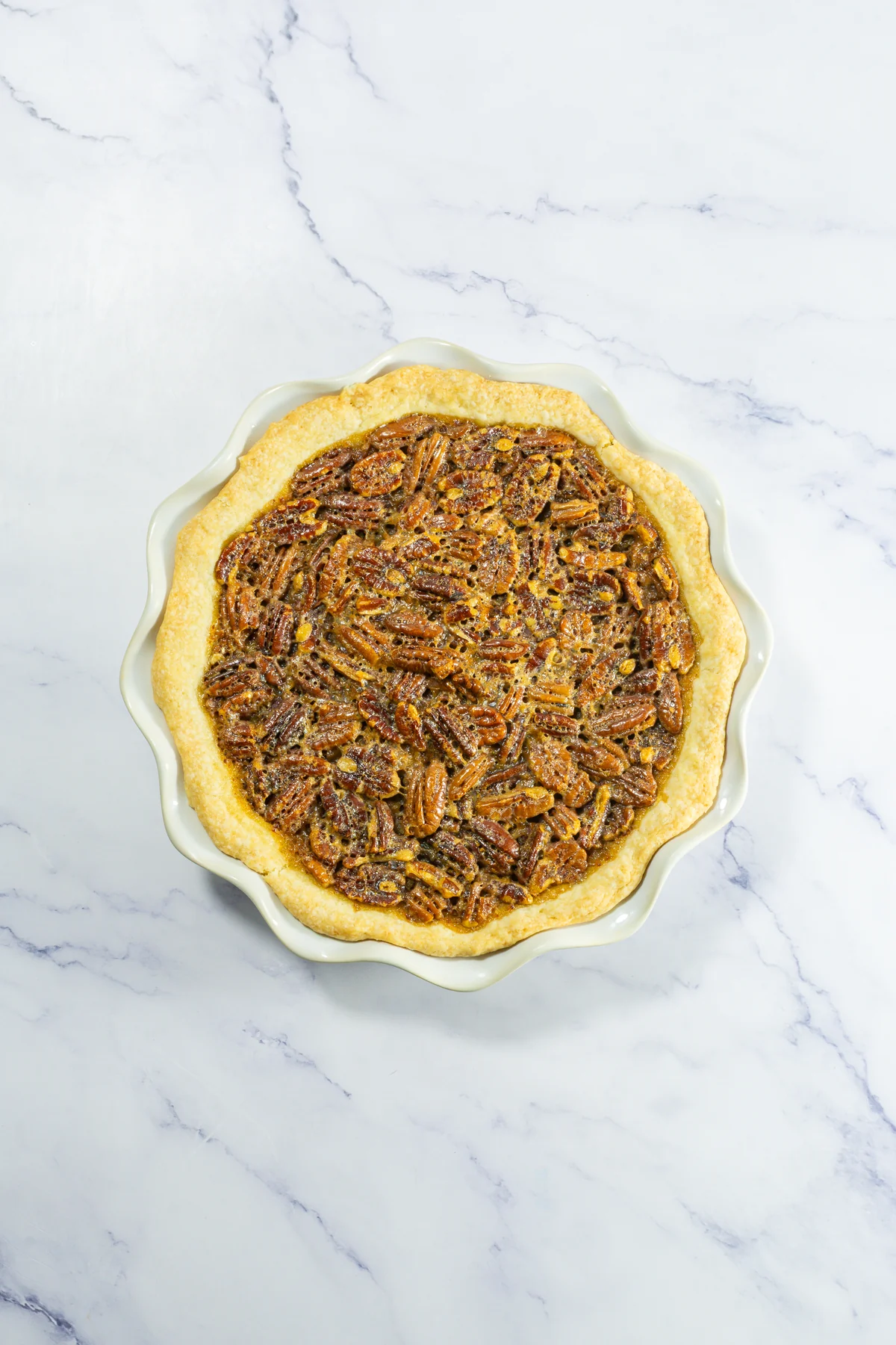 Finished bourbon pecan pie cooling after baking.