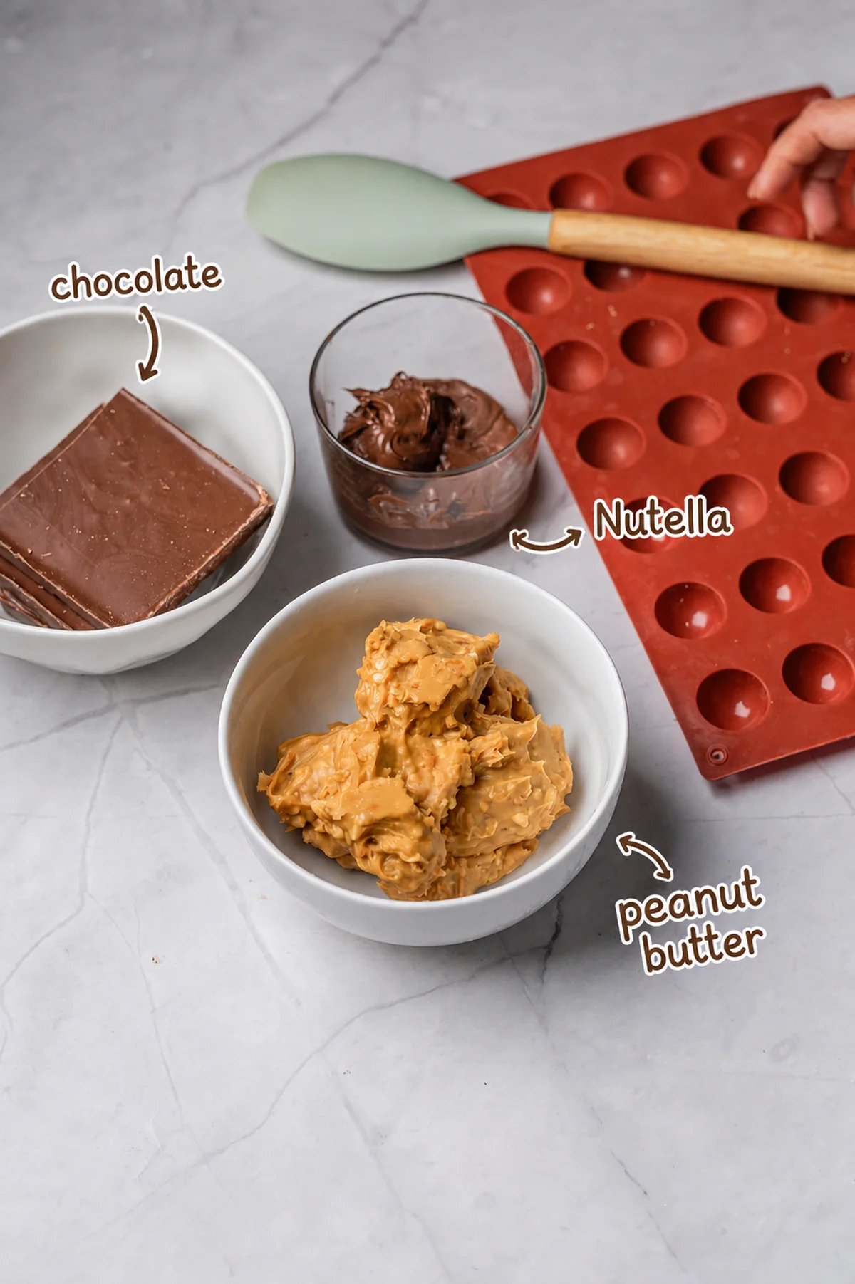 Peanut butter, Nutella, and chocolate labeled for peanut butter balls.